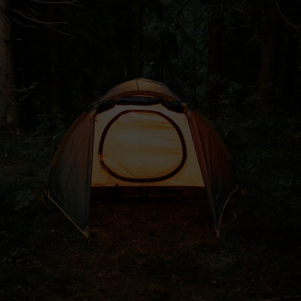 Tent beside a lake in nature